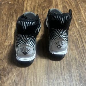 Boys under armour football cleats.